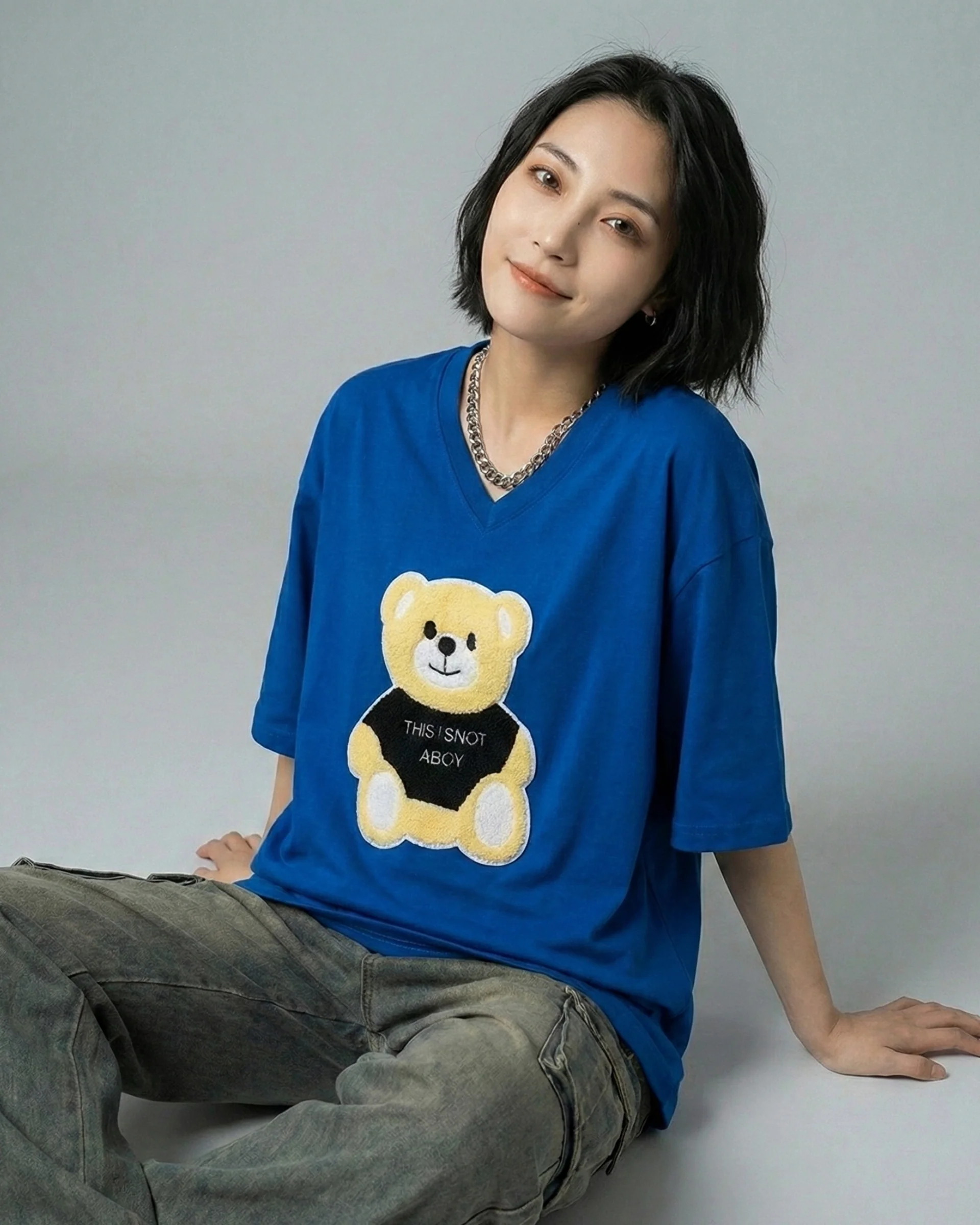 Moschino Embroidered Patched Oversized V-Neck Tee Blue